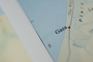Photo of a map showing Gaza, by CHUTTERSNAP on Unsplash